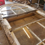 On the bench window to be restored now in the workshop