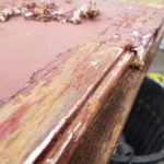 removing thick paint to reveal a bead