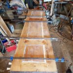 Listed doors being cramped up and new wedges bashed in with a rubber mallet
