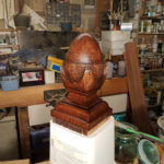 Acorn turned from original capping then clasps were carved