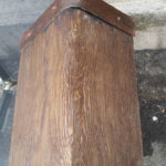 distressed beam with fake metal strap to hide join