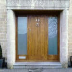 Solid oak door with satin glass side lights in Cleveland Walk Bath