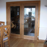 door in oak with full glass panels