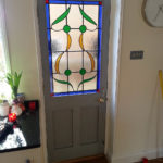 door painted idigbo with stain glass panel
