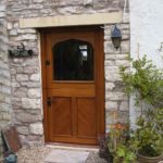 door stable door in oak with cross boarding and glazed top door