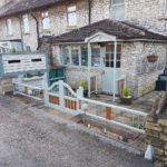 gate and fence in idigbo oak and aluminium