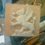 gryphon carved out of polyester resin which give crisp detail