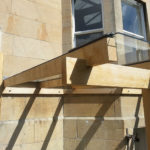 green oak lean-to with glass roof