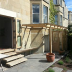 green oak lean-to with glass roof