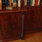 secret bookcase door showing fluted columns and mahogany curl veneer with inlay and crossbanding on doors