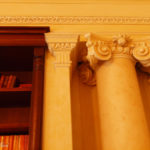 secret bookcase doors at great pulteney street showing new piller with plaster capitals made to match columns uk
