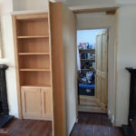 secret bookcase door in london with door open