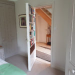 secret bookcase door open