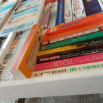 secret bookcase door showing resin book secret handle