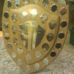 trophy in curved oak