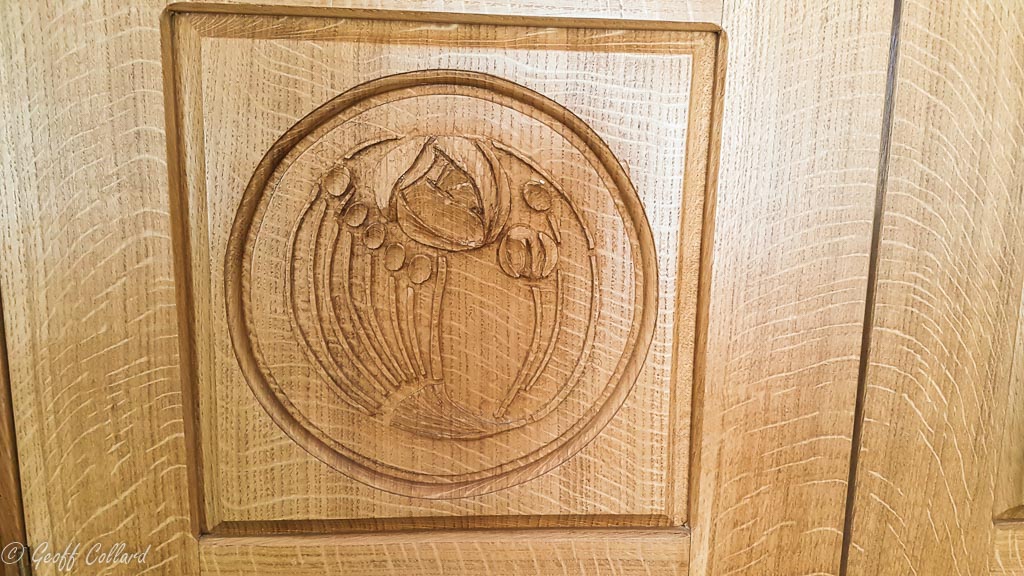 Charles Rennie Mackintosh rose carved in quater sawn oak