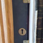 Lock hidden by books
