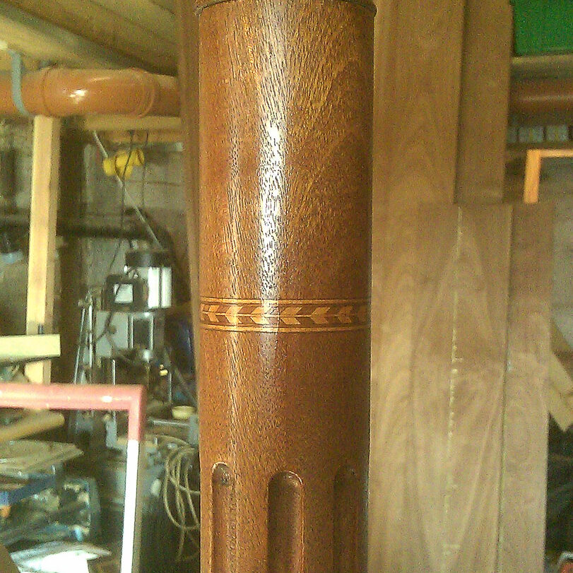 fluted turned post with feather inlay
